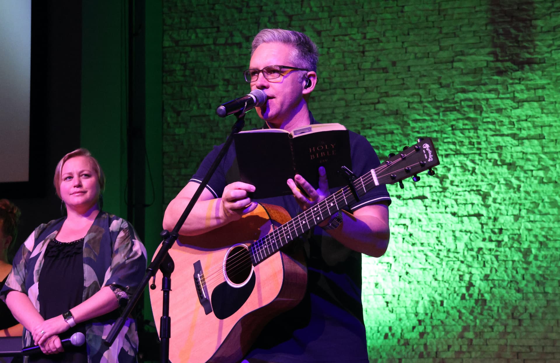 Mark Paul leading worship with a church team